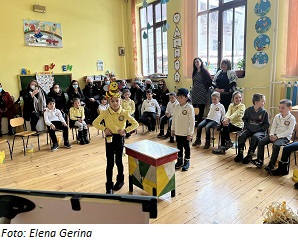 Children presenting school club bee related activites