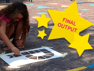 Child drawing the Playful Paradigm logo on a pavement