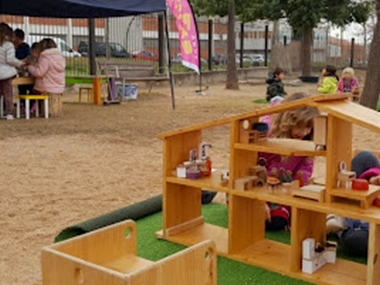 Children playing in a public garden in Esplugues de Llobregat, Spain