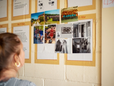 Lisa reviewing photographs for the exhibition
